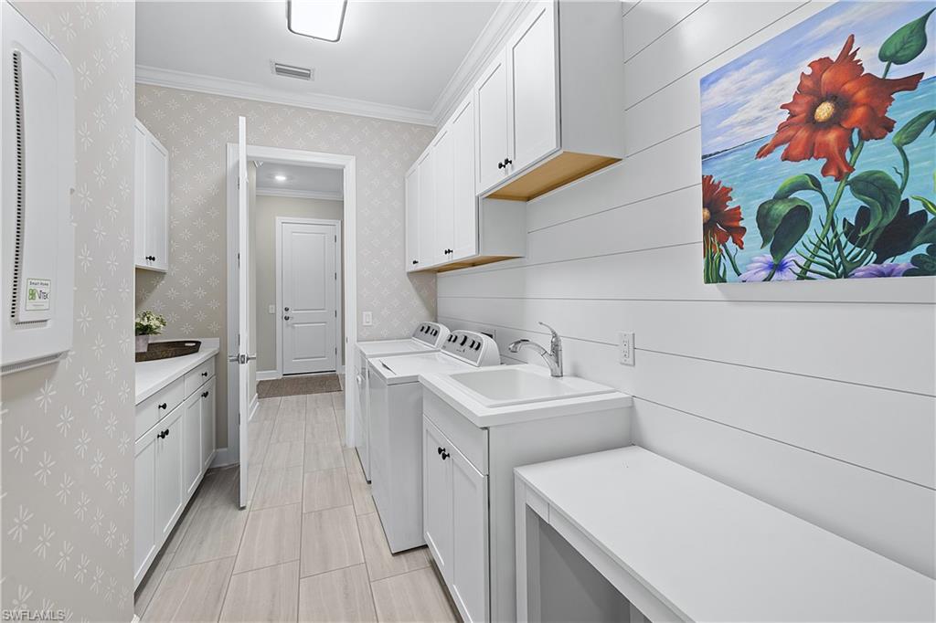 19074 Elston Way Estero, FL 33928 - Photo 45 of 50 a utility room with dryer and washer