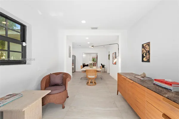 a living room with furniture and a table