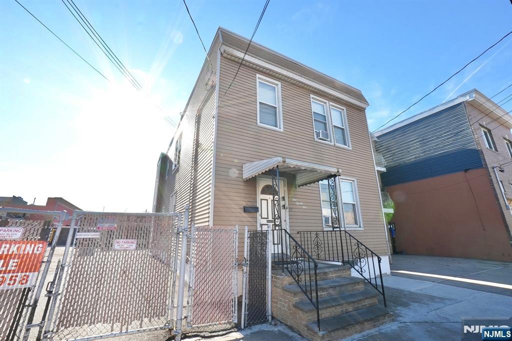 125 Malvern Street Newark, NJ 07105 - Photo 1 of 19 a front view of a house