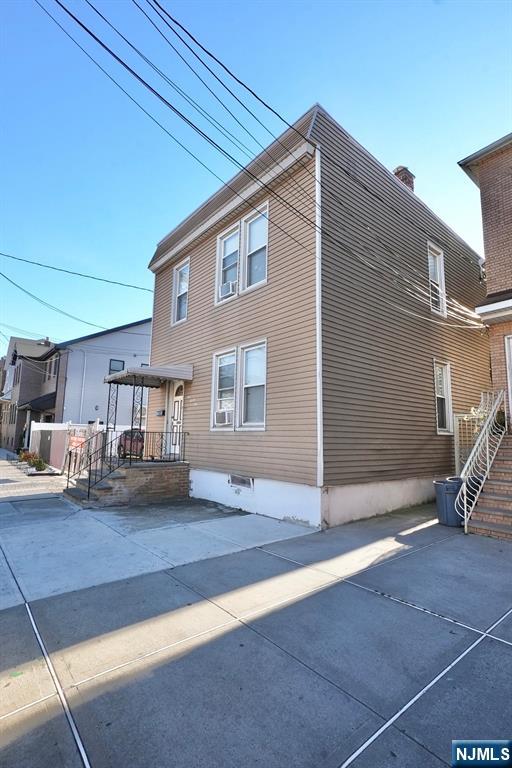 125 Malvern Street Newark, NJ 07105 - Photo 2 of 19 a view of a house with a patio