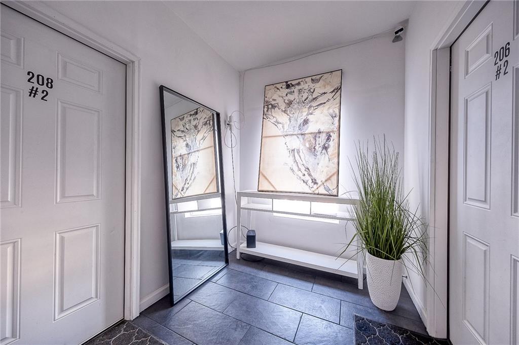 206 North Chestnut Street Derry, PA 15627 - Photo 17 of 33 a bathroom with a bathtub and a shower