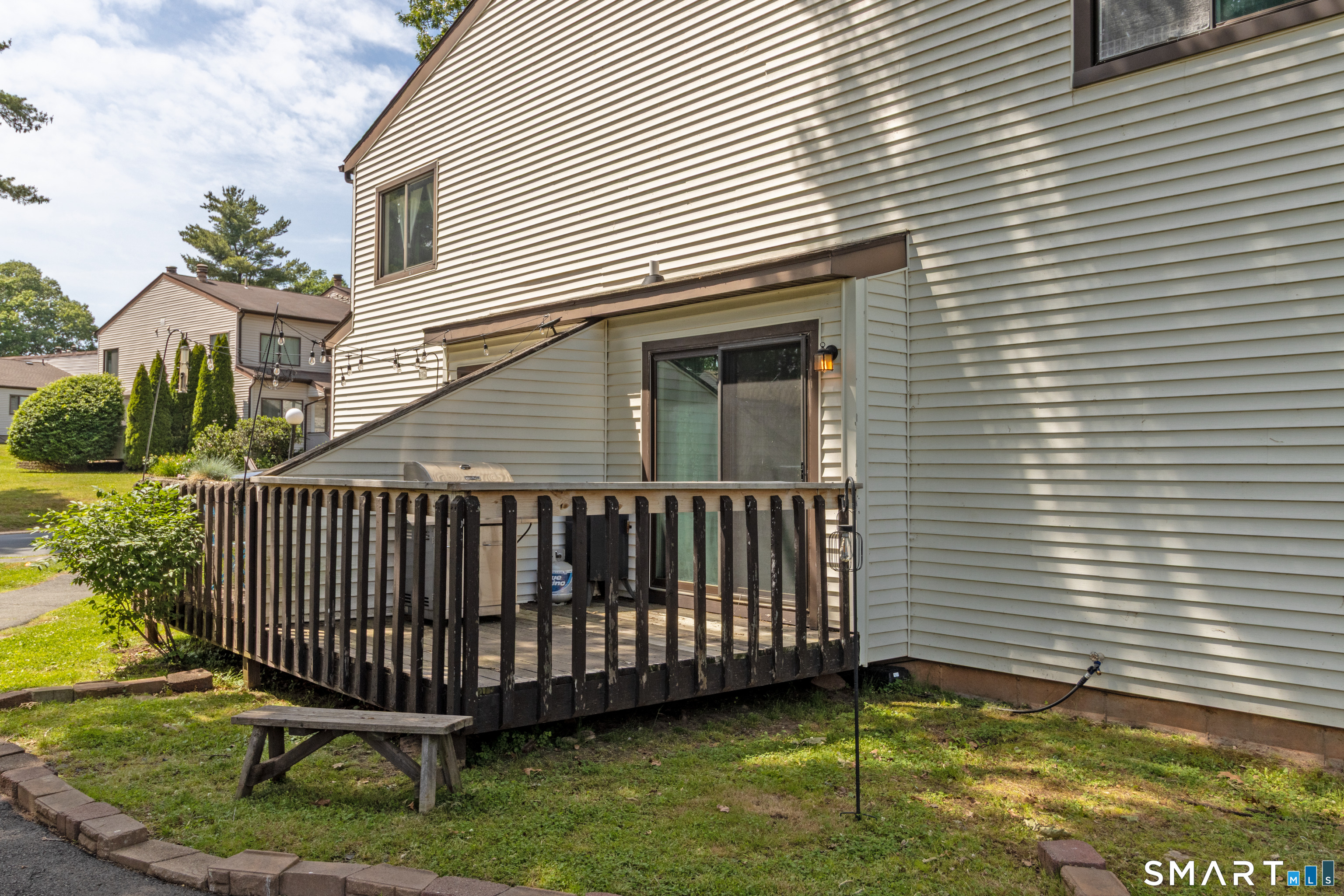94 Cottonwood Road, Unit 94 Newington, CT 06111 - Photo 28 of 33 Second deck off Living Room facing Cottonwood Road.