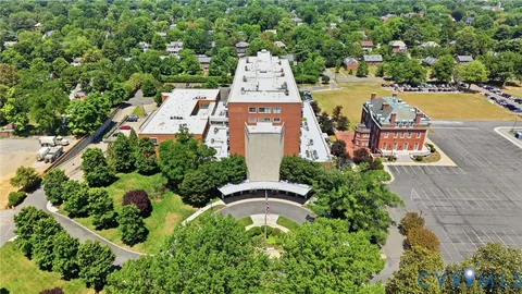 an aerial view of a house with outdoor space sitting space and pool view
