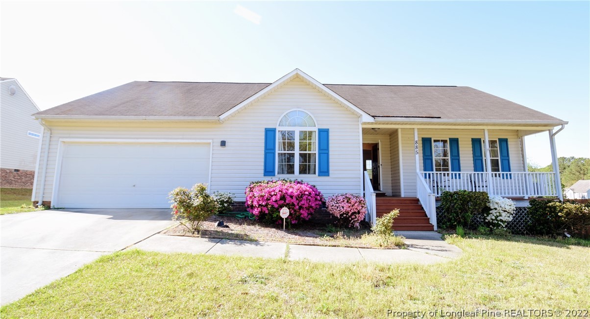 885 Ridge Road Fayetteville, NC 28311 - Photo 1 of 21 a front view of a house with yard