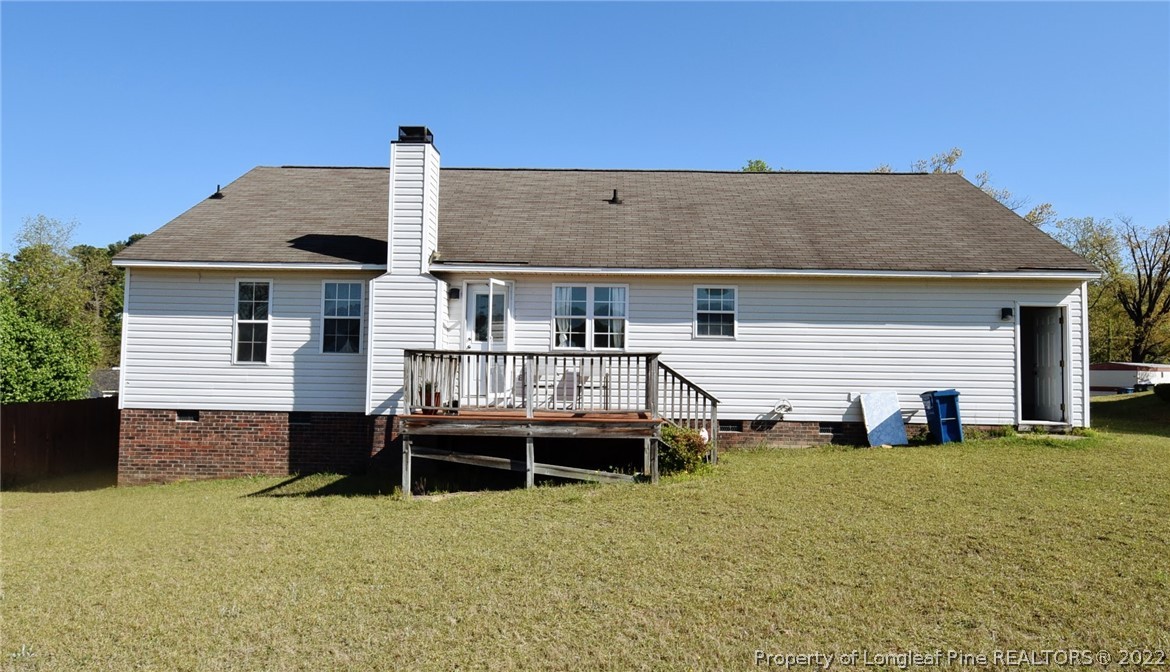 885 Ridge Road Fayetteville, NC 28311 - Photo 21 of 21 a front view of a house with a yard