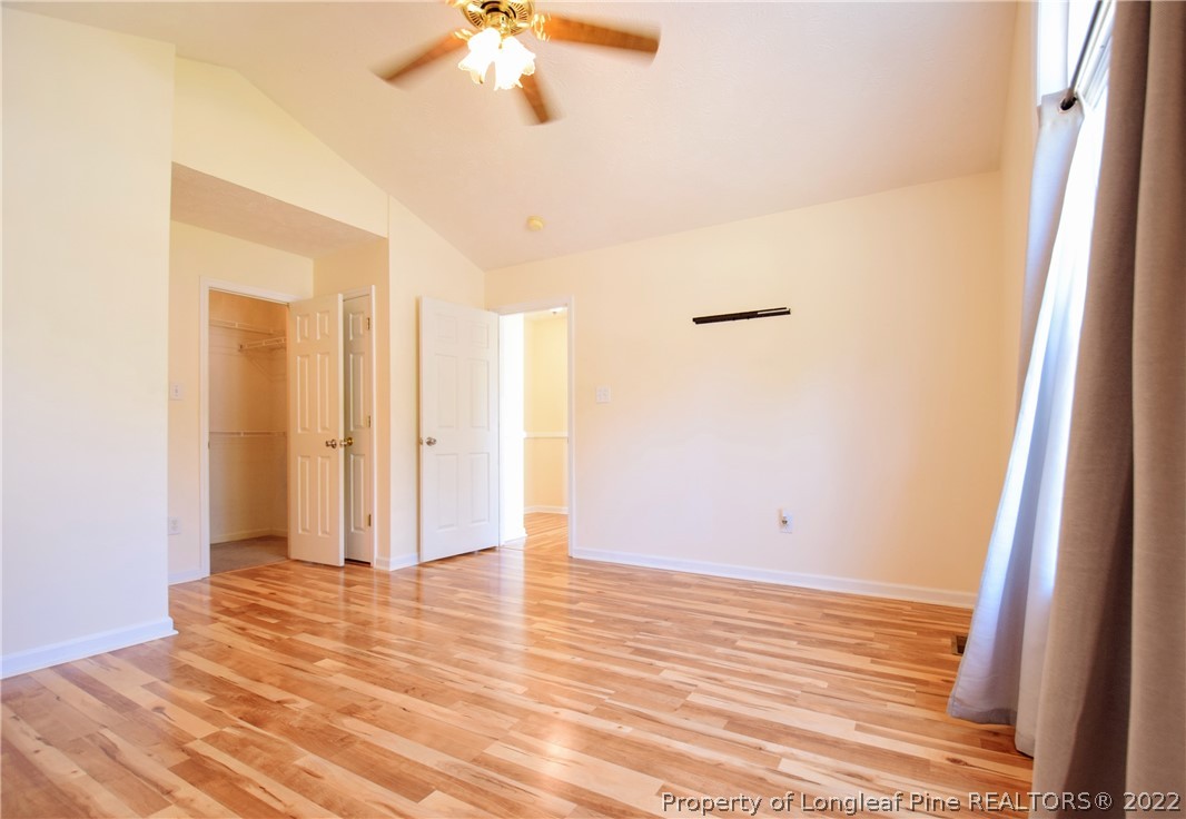 885 Ridge Road Fayetteville, NC 28311 - Photo 9 of 21 a view of a room with wooden floor and bathroom