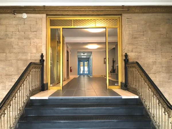 a view of gallery with wooden floor