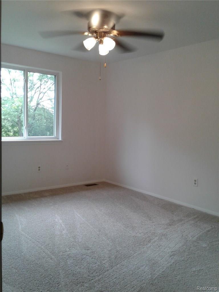 8488 Pepper Ridge Drive Grand Blanc, MI 48439 - Photo 19 of 24 MASTER OVERLOOKS BACK YARD