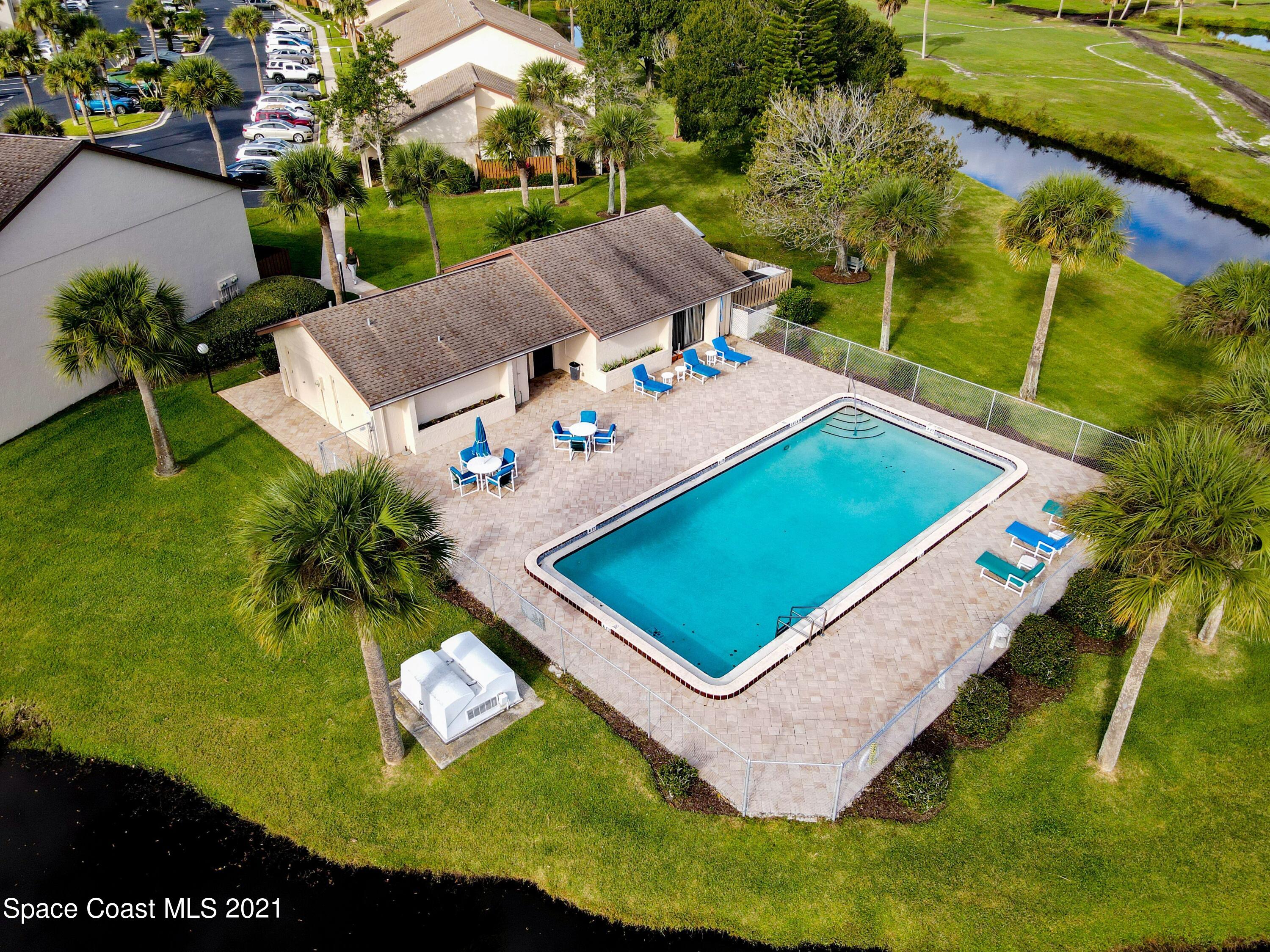 2210 Golf Isle Drive, Unit 906 Melbourne, FL 32935 - Photo 14 of 74 an aerial view of a house
