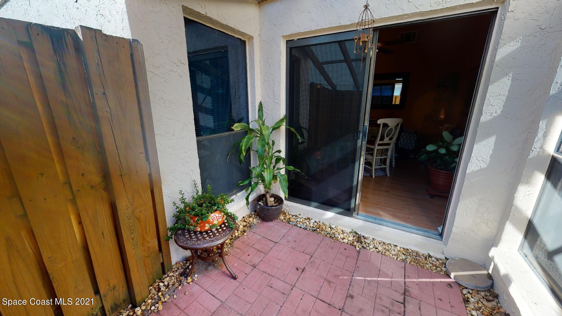 2210 Golf Isle Drive, Unit 906 Melbourne, FL 32935 - Photo 31 of 74 a view of a entryway door of the house