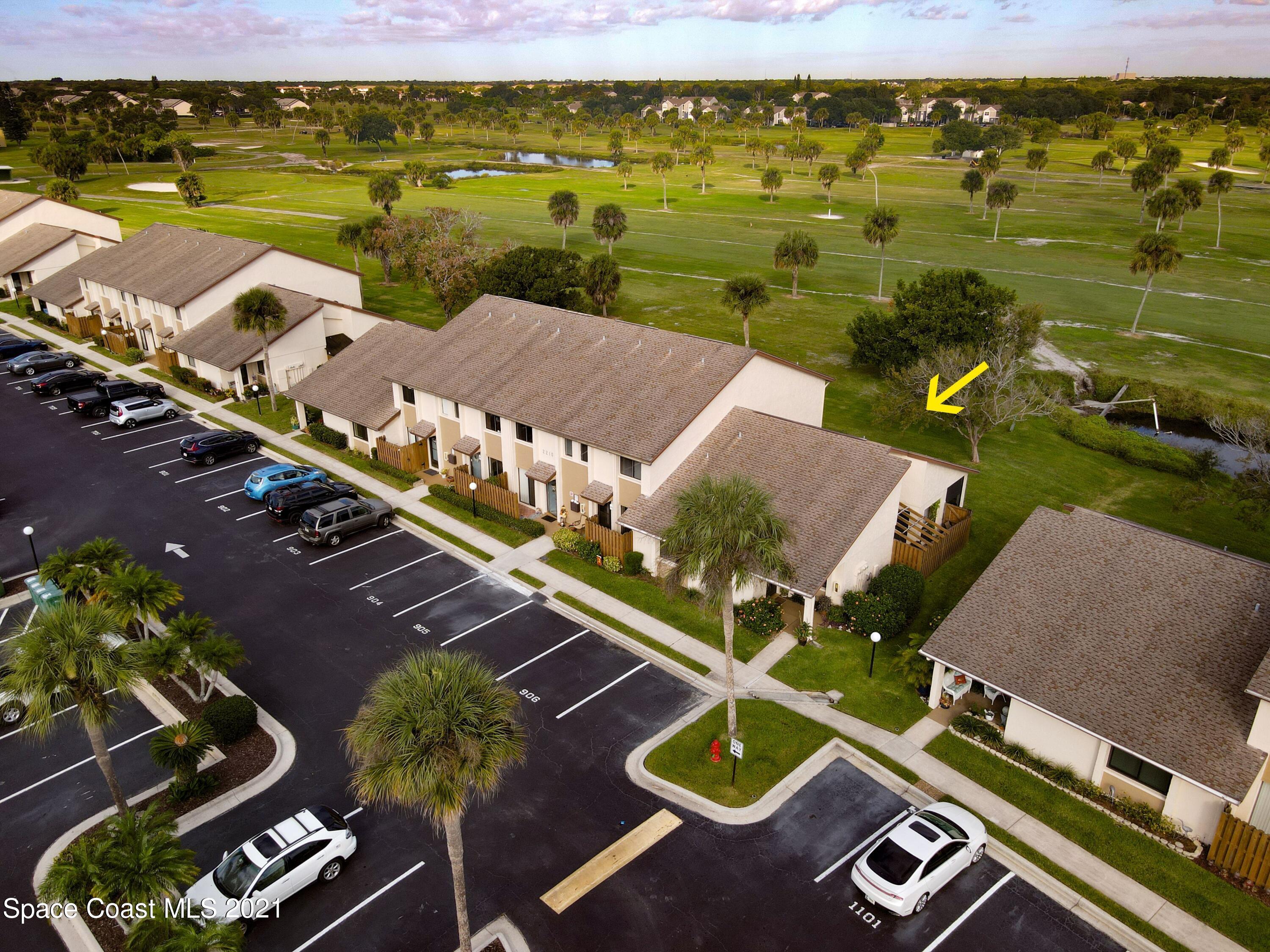 2210 Golf Isle Drive, Unit 906 Melbourne, FL 32935 - Photo 7 of 74 an aerial view of a pool table and chairs