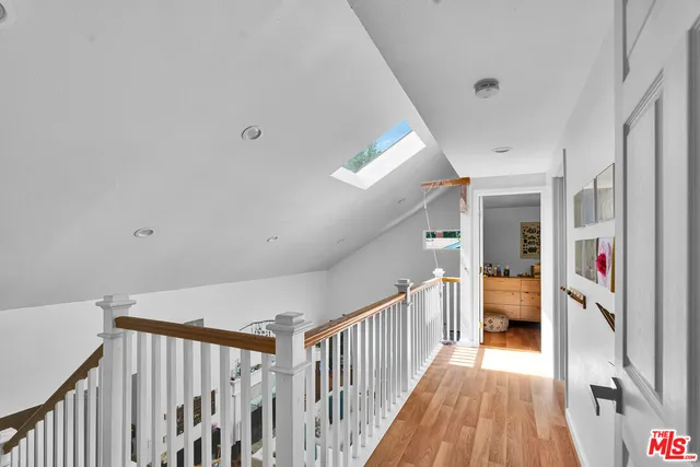 a bed room with a bed and a window