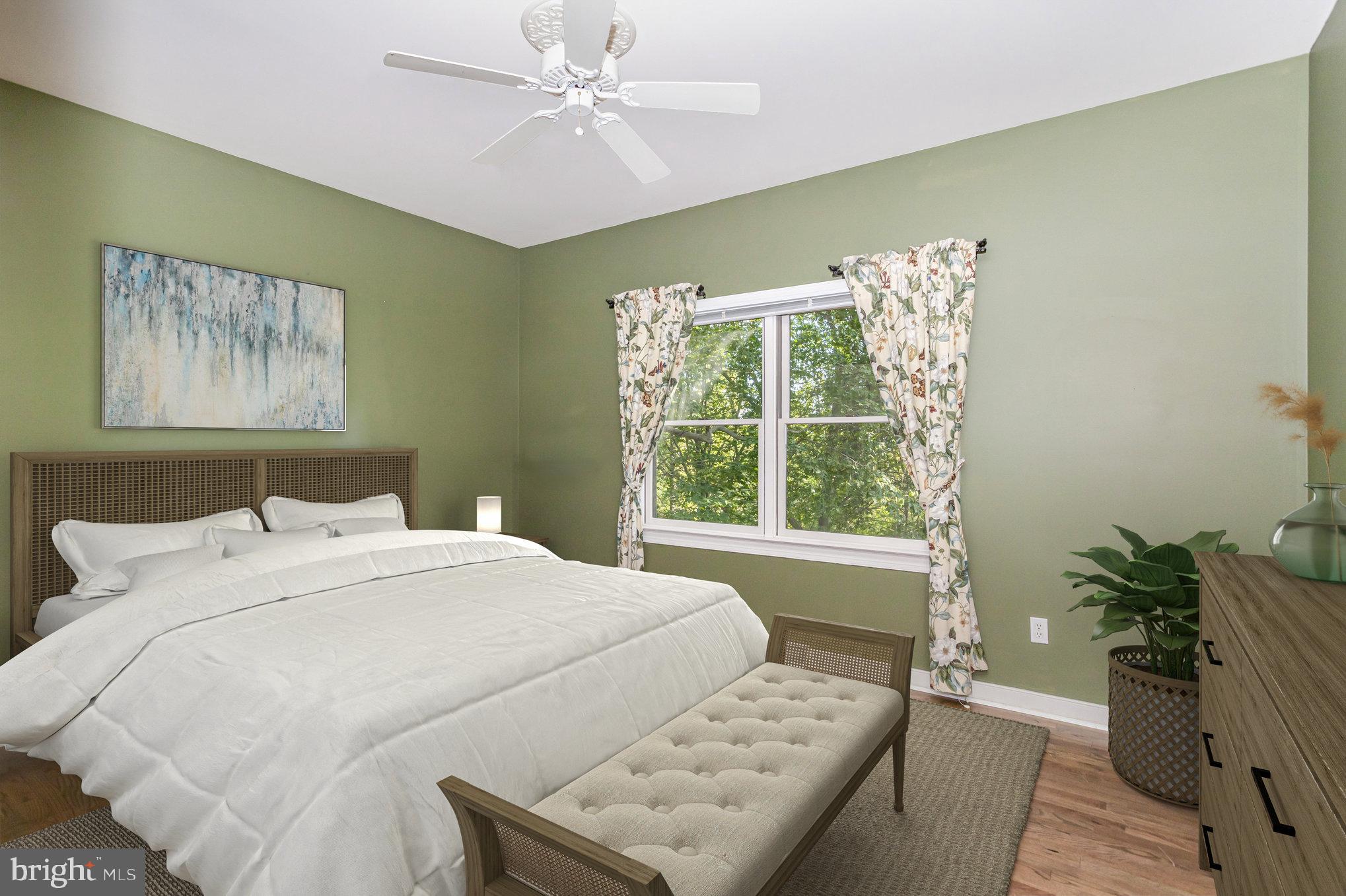 1817 Dogwood Road Harrisburg, PA 17110 - Photo 17 of 64 a bedroom with a bed and a window