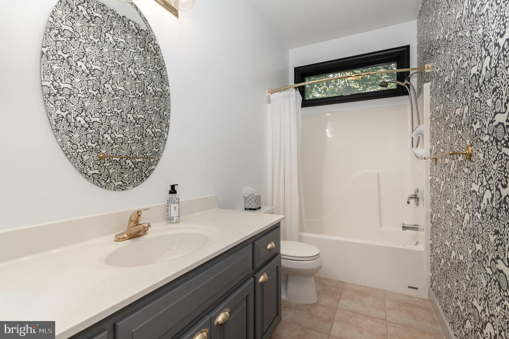 1817 Dogwood Road Harrisburg, PA 17110 - Photo 43 of 64 a bathroom with a sink a toilet and shower