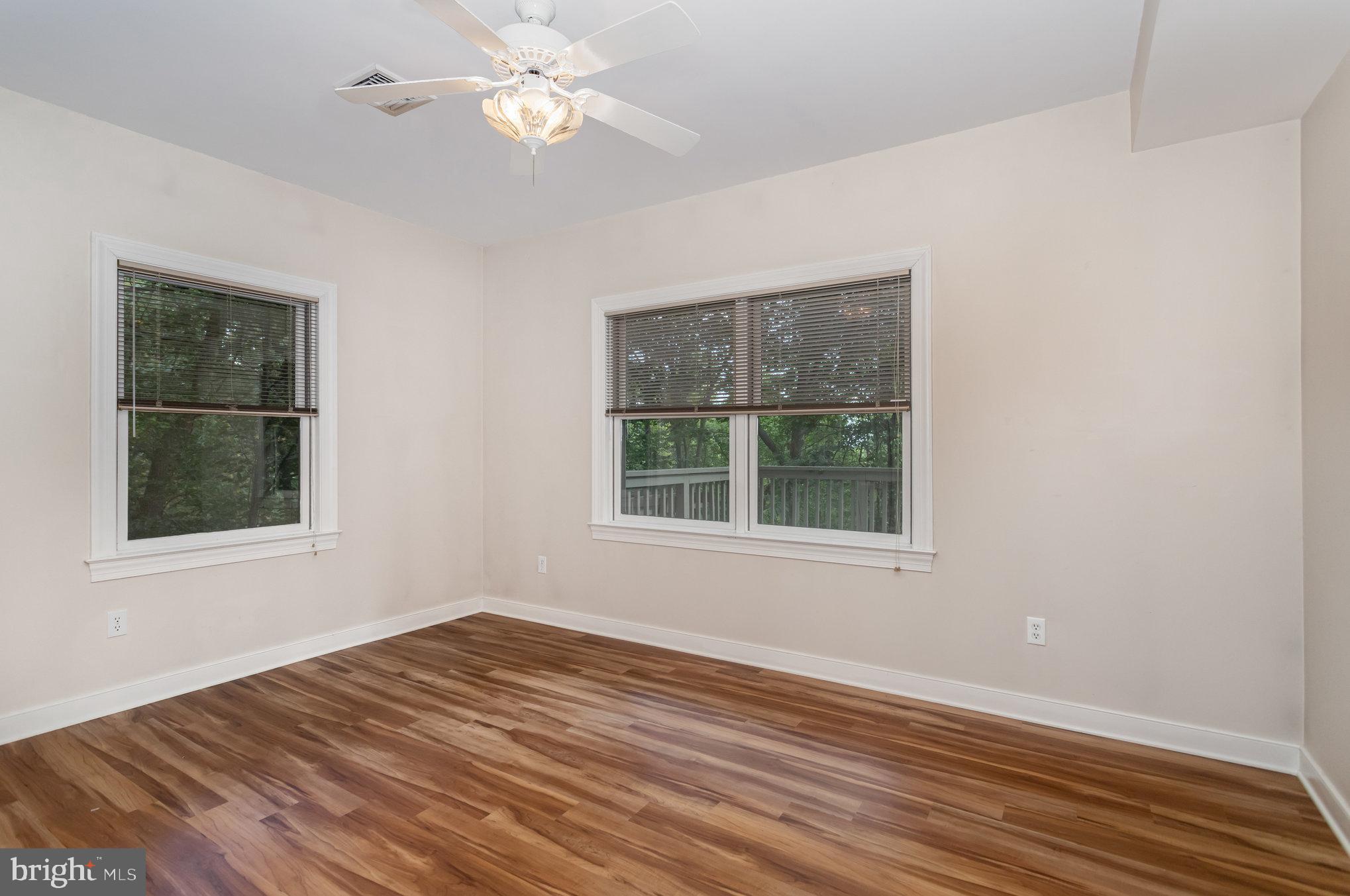1817 Dogwood Road Harrisburg, PA 17110 - Photo 50 of 64 an empty room with wooden floor and a window