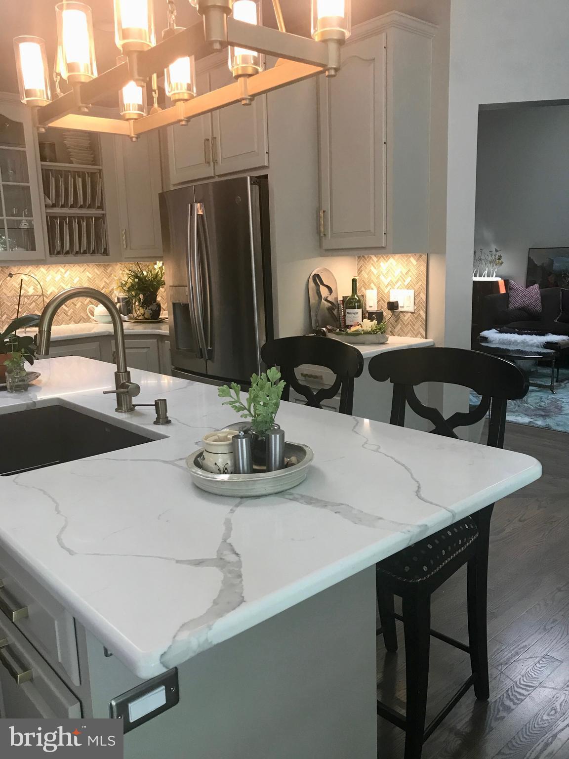 1817 Dogwood Road Harrisburg, PA 17110 - Photo 7 of 64 a kitchen with a table chairs and refrigerator