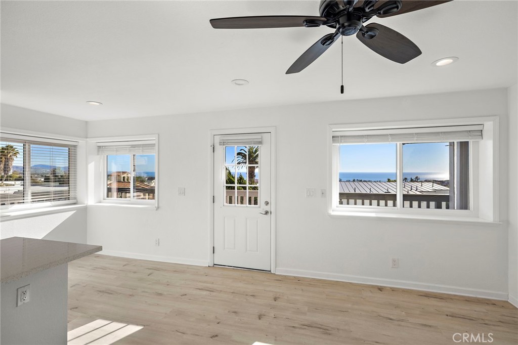 33771 Copper Lantern Street, Unit B Dana Point, CA 92629 - Photo 4 of 14 a view of an empty room and window