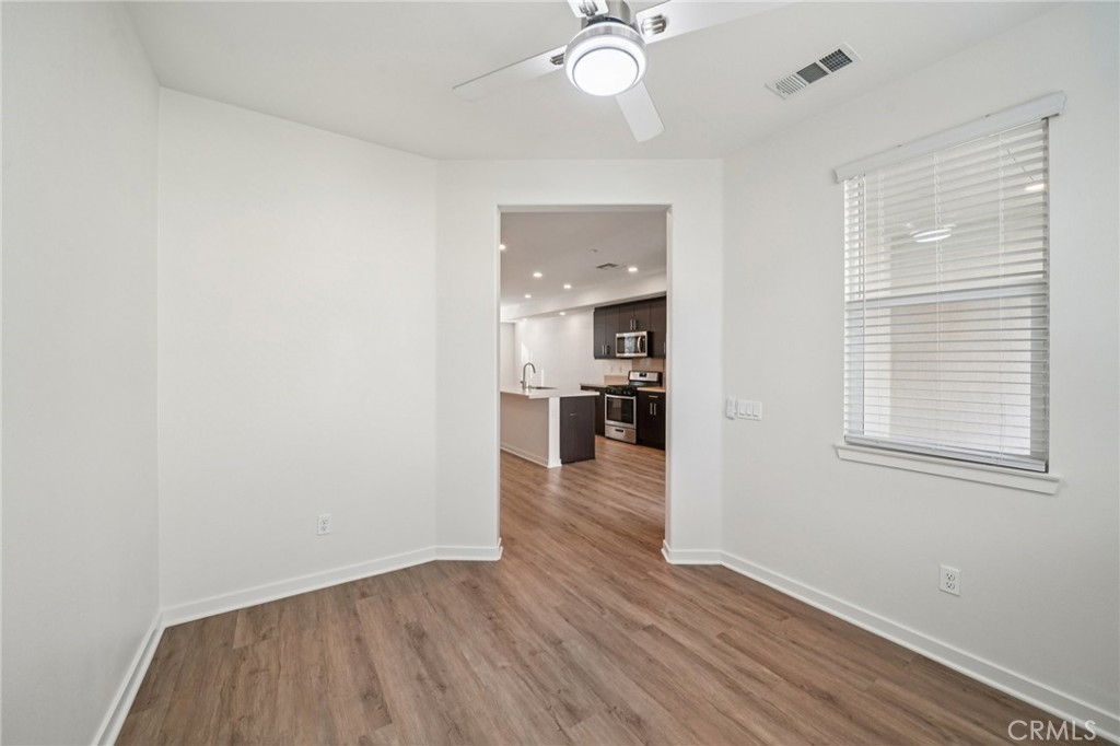 9422 Shade Place Rancho Cucamonga, CA 91730 - Photo 22 of 72 wooden floor in an empty room with a window