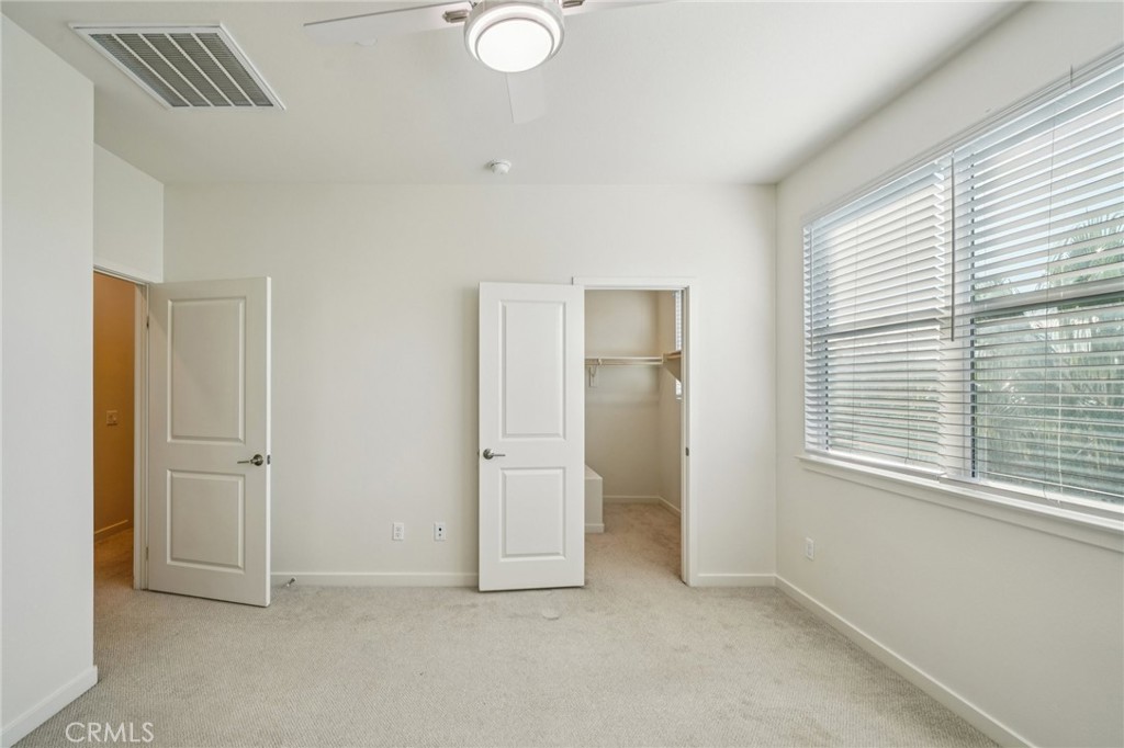 9422 Shade Place Rancho Cucamonga, CA 91730 - Photo 25 of 72 a view of an empty room with a window