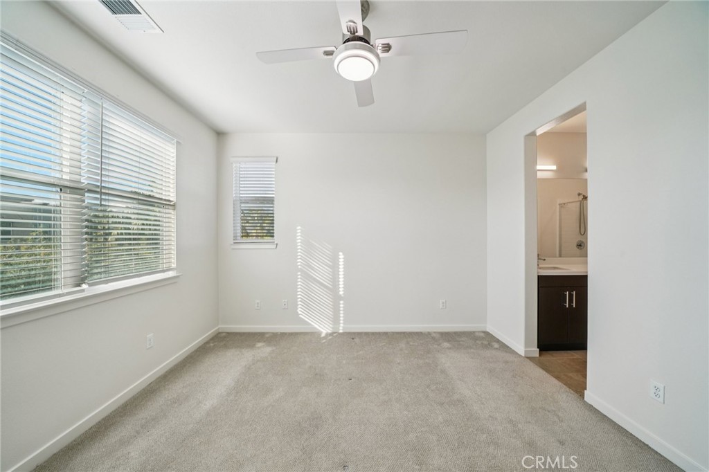 9422 Shade Place Rancho Cucamonga, CA 91730 - Photo 27 of 72 a view of an empty room with a window
