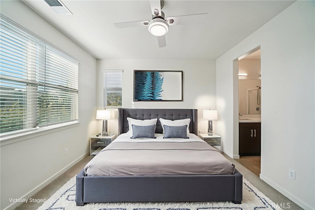 9422 Shade Place Rancho Cucamonga, CA 91730 - Photo 28 of 72 a bedroom with a bed and a window