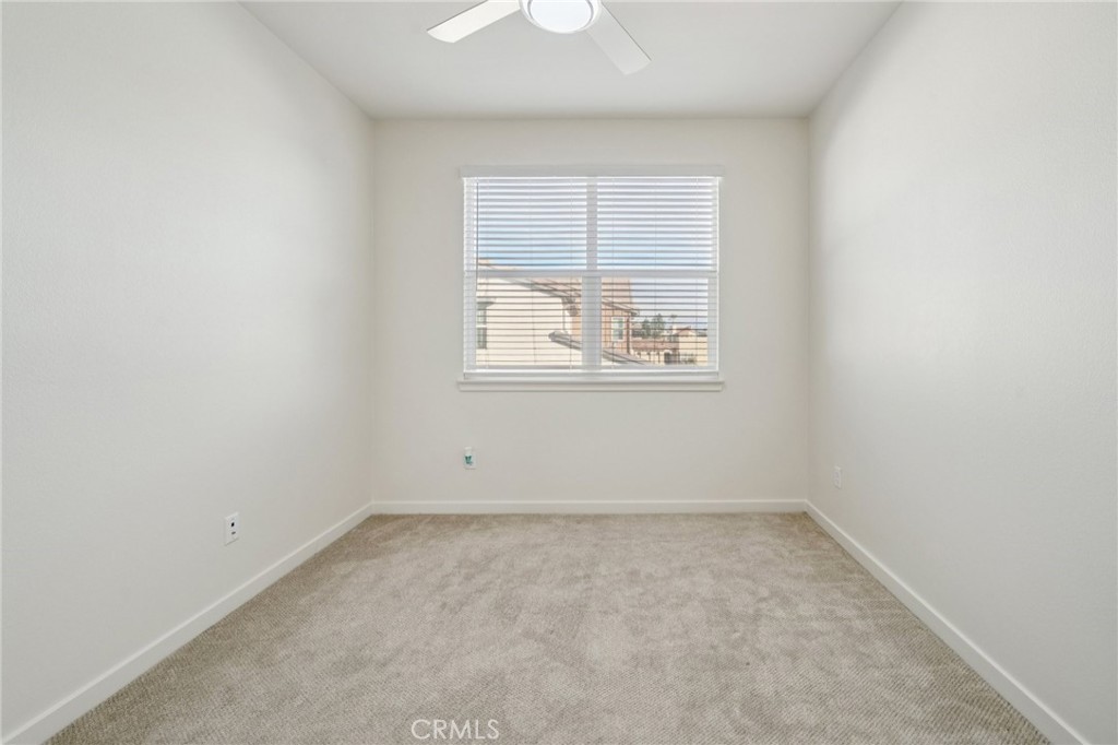 9422 Shade Place Rancho Cucamonga, CA 91730 - Photo 38 of 72 an empty room with a window