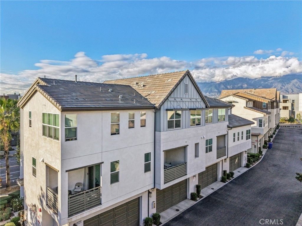 9422 Shade Place Rancho Cucamonga, CA 91730 - Photo 56 of 72 a view of a house with wooden fence