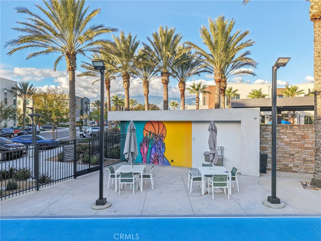 9422 Shade Place Rancho Cucamonga, CA 91730 - Photo 67 of 72 a view of a swimming pool with chairs