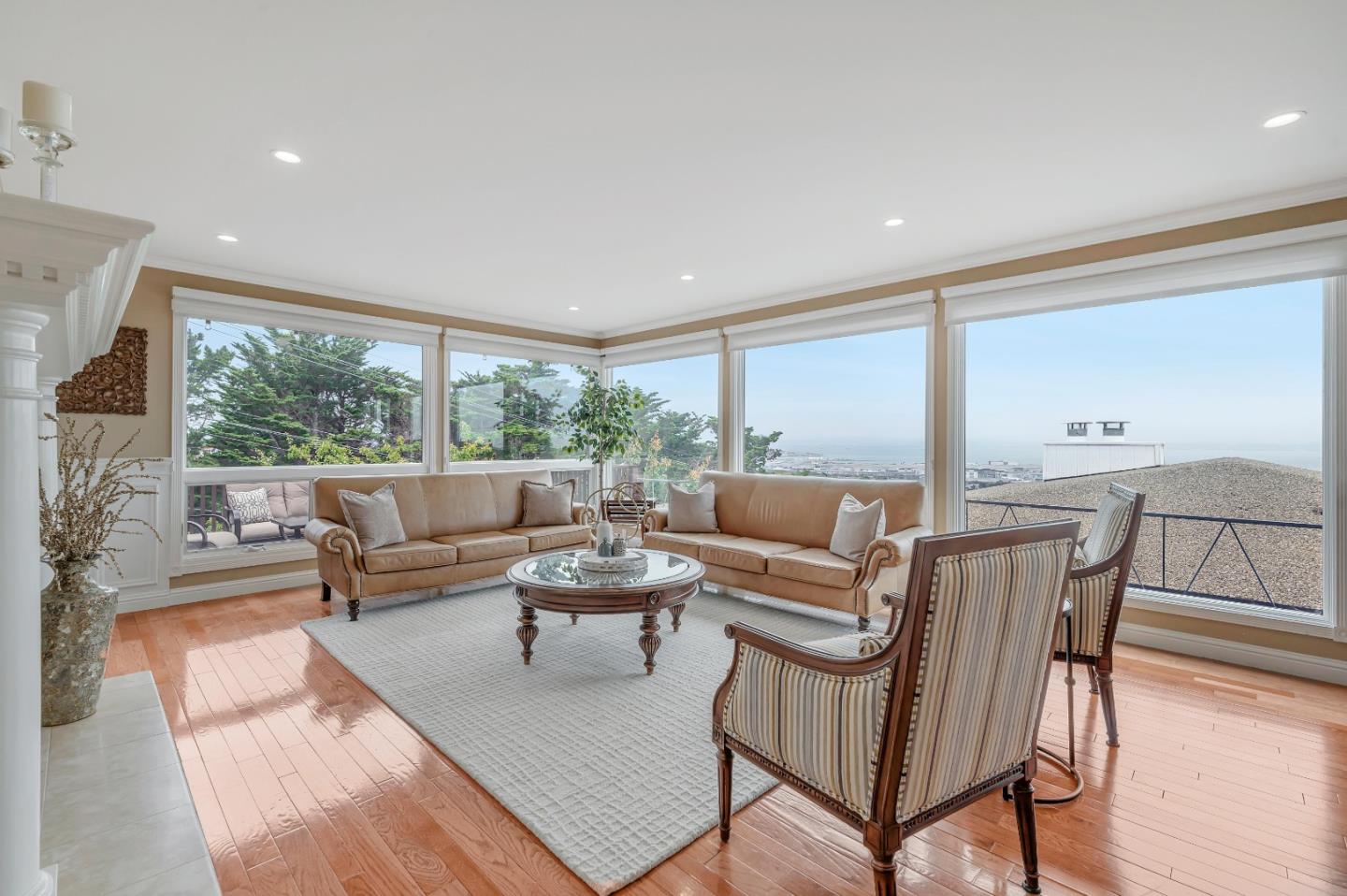 305 La Prenda Millbrae, CA 94030 - Photo 11 of 50 a living room with furniture and a large window