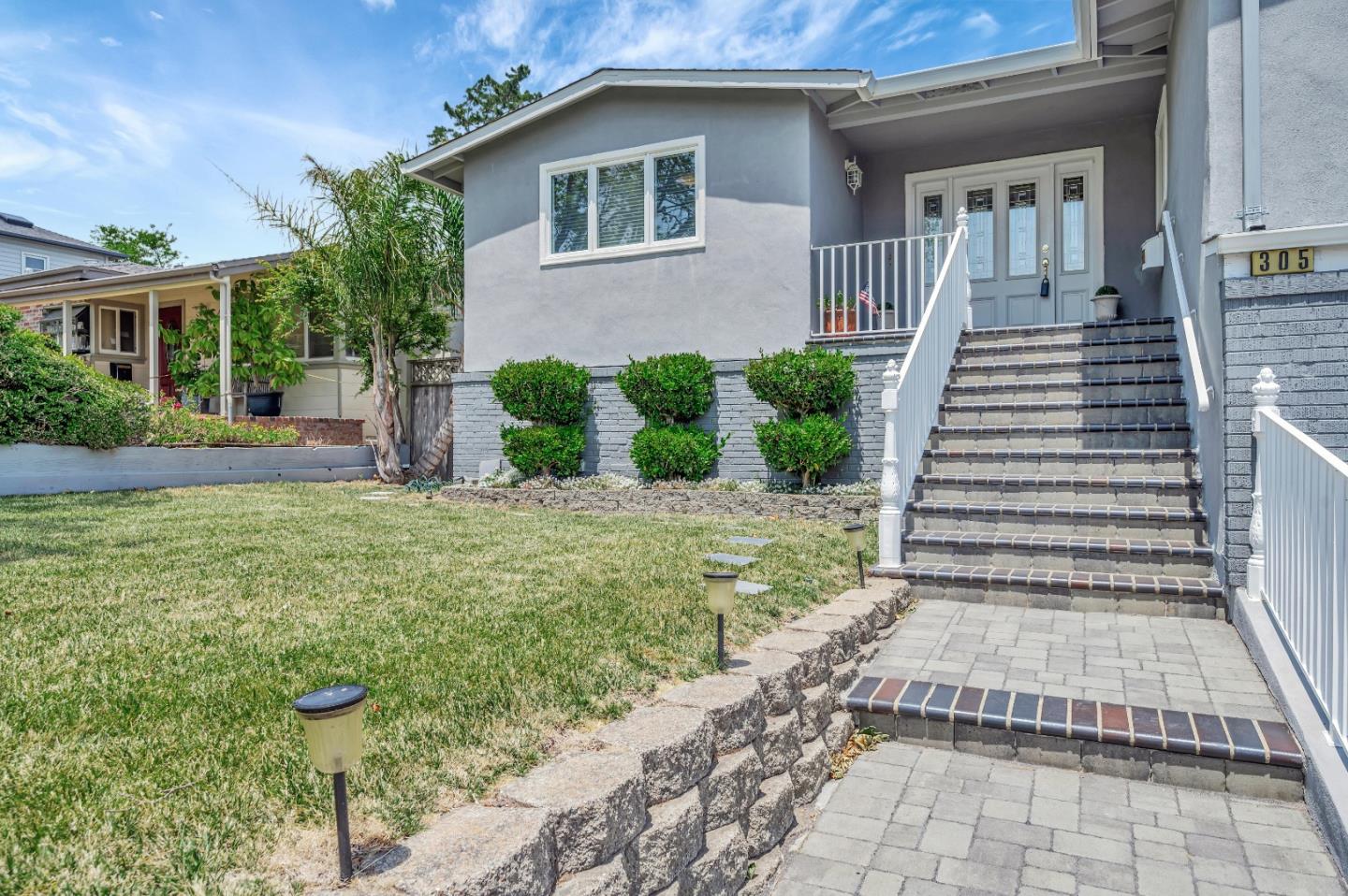 305 La Prenda Millbrae, CA 94030 - Photo 2 of 50 a front view of a house with garden