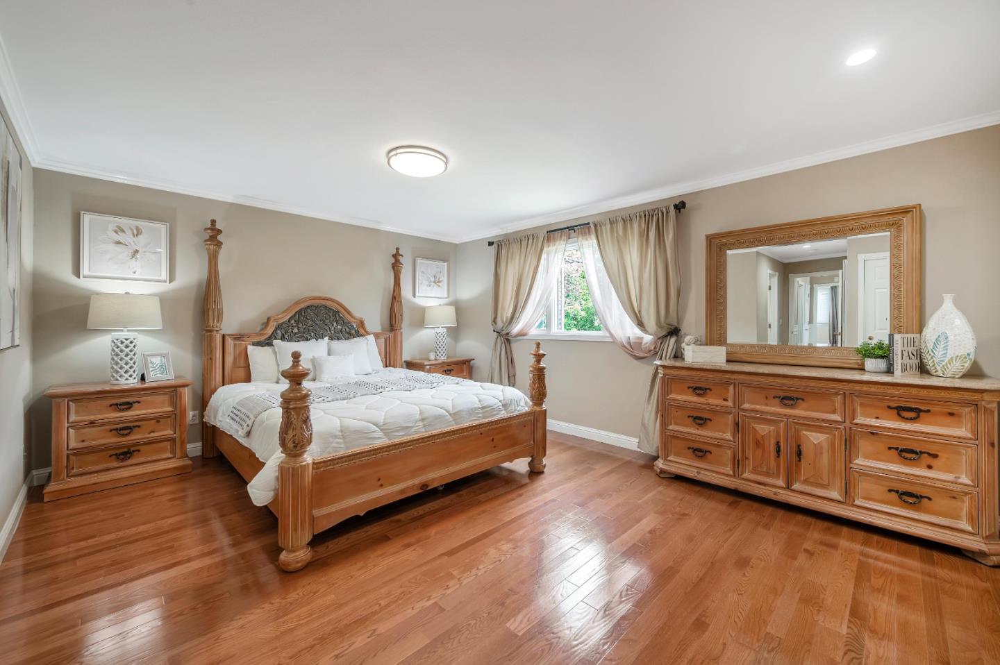 305 La Prenda Millbrae, CA 94030 - Photo 27 of 50 a bedroom with a bed and a dresser