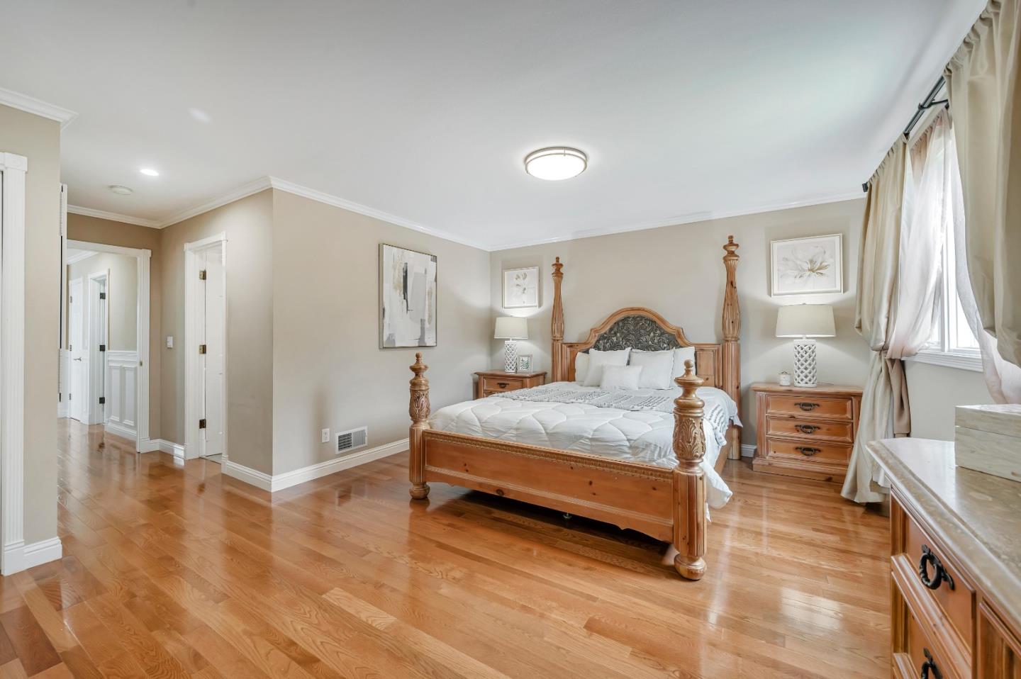 305 La Prenda Millbrae, CA 94030 - Photo 28 of 50 a bedroom with a bed and a large window