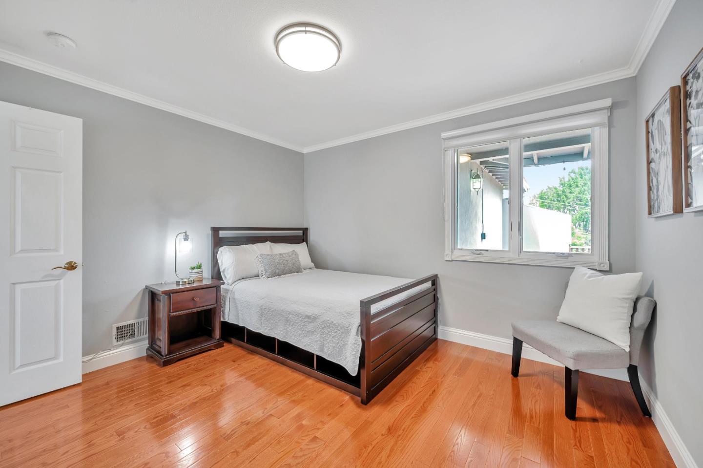 305 La Prenda Millbrae, CA 94030 - Photo 31 of 50 a bedroom with a bed and window