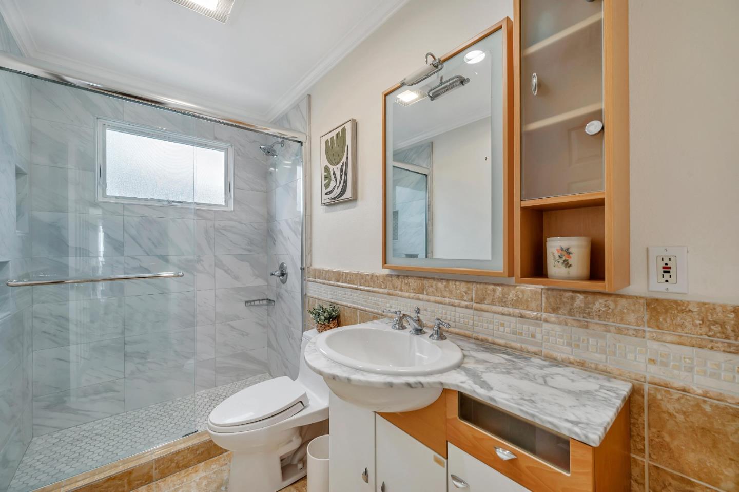 305 La Prenda Millbrae, CA 94030 - Photo 38 of 50 a bathroom with a sink and a mirror