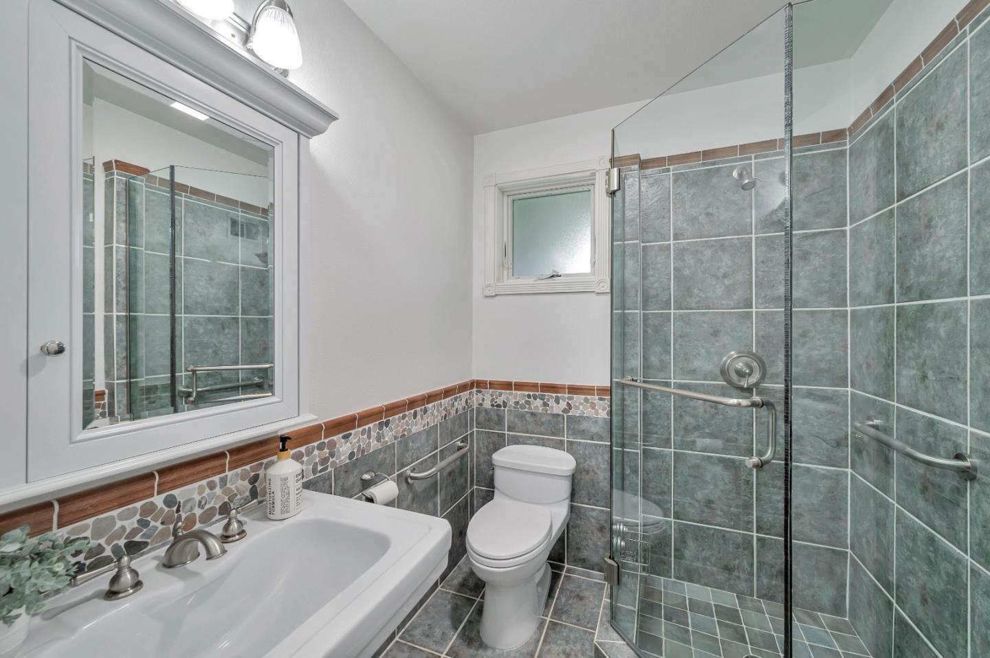 305 La Prenda Millbrae, CA 94030 - Photo 39 of 50 a bathroom with a sink toilet and shower