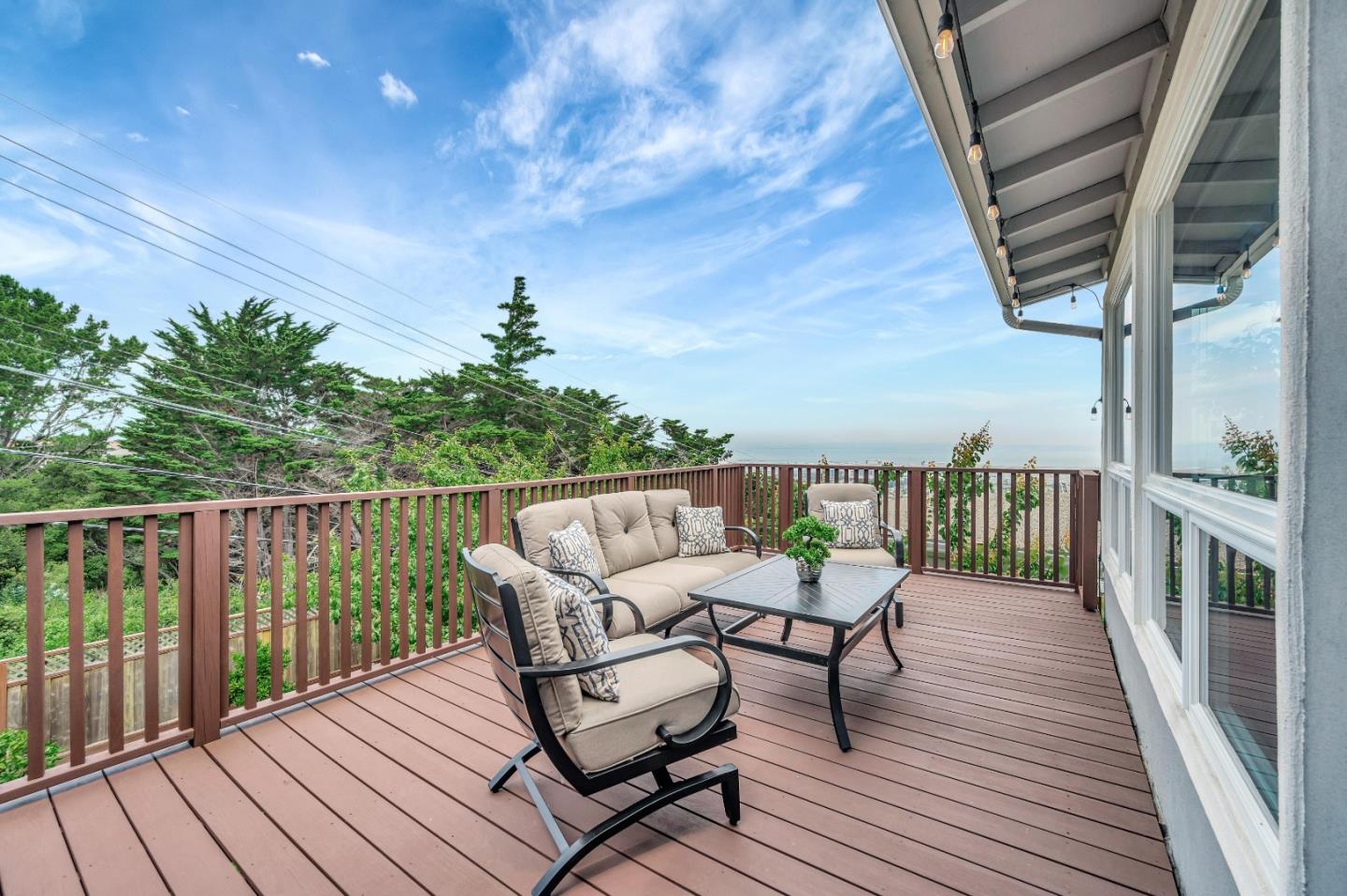305 La Prenda Millbrae, CA 94030 - Photo 40 of 50 a balcony with wooden floor outdoor seating and wooden floor