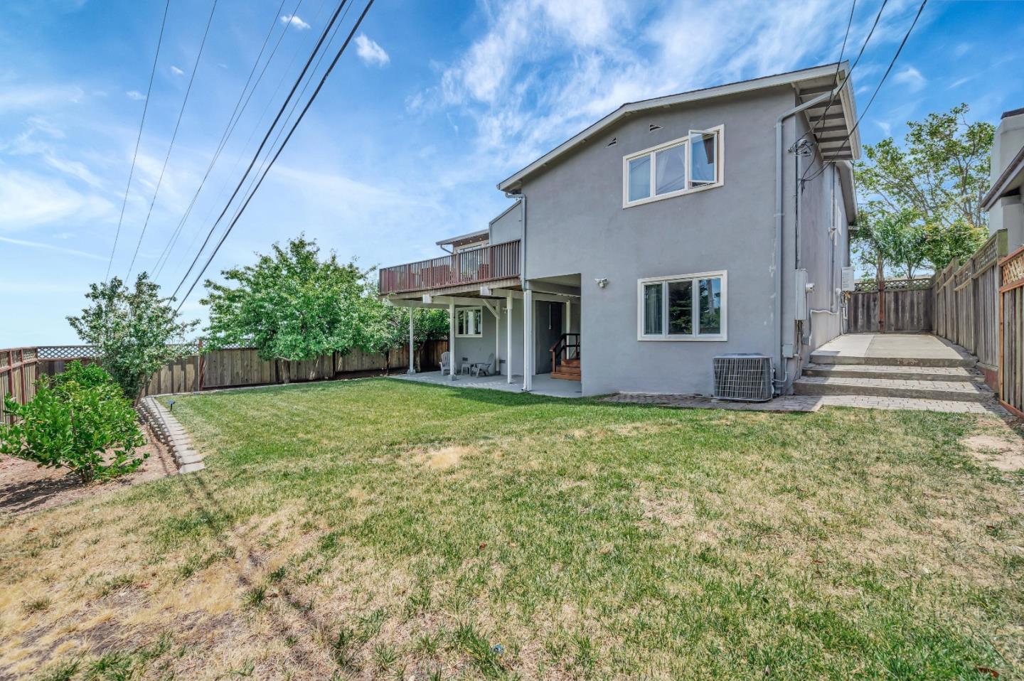 305 La Prenda Millbrae, CA 94030 - Photo 45 of 50 a backyard of a house with lots of green space