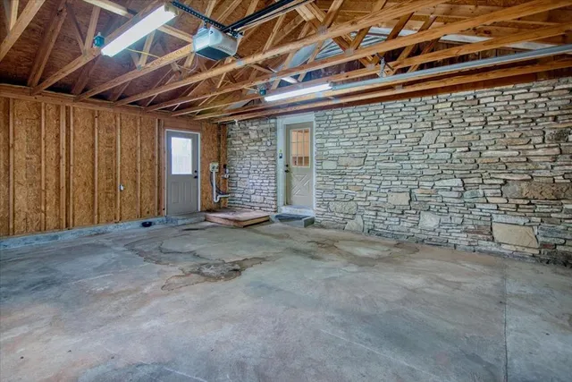 a view of a room with wooden walls