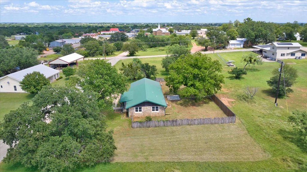 1013 Church Street Mason, TX 76856 - Photo 8 of 25 an aerial view of a house with a yard and lake view