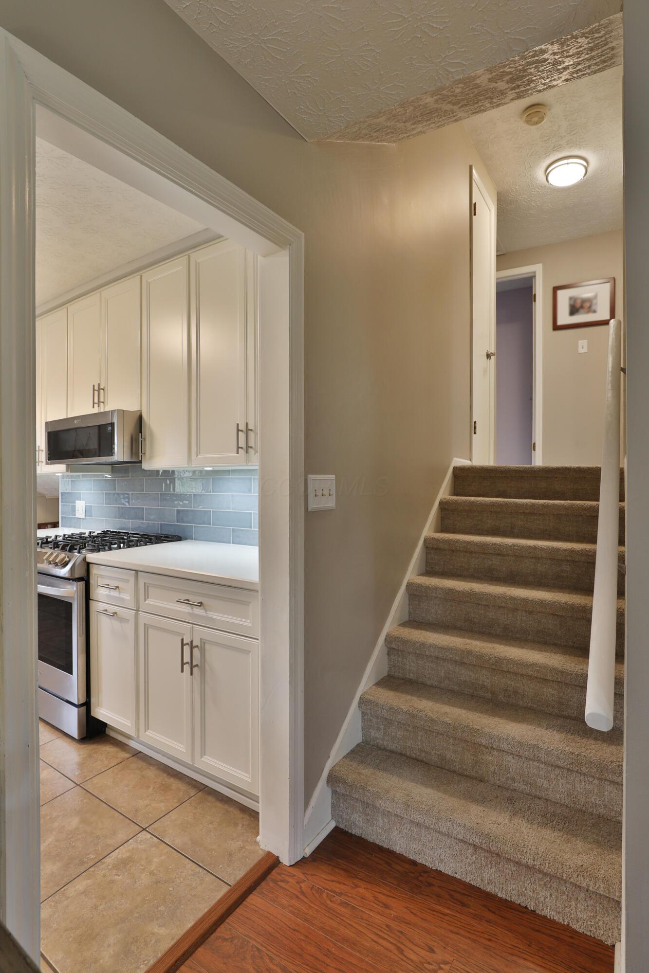 7044 Linworth Road Columbus, OH 43235 - Photo 19 of 48 Stairs to second floor