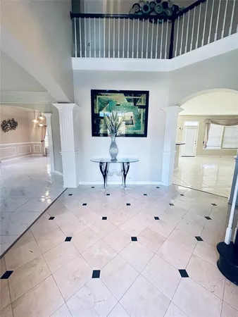 a view of kitchen with furniture and wooden floor