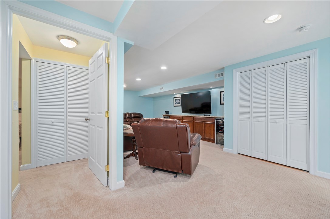 130 Bear Hill Road, Unit 302 Cumberland, RI 02864 - Photo 31 of 42 Lower level family room