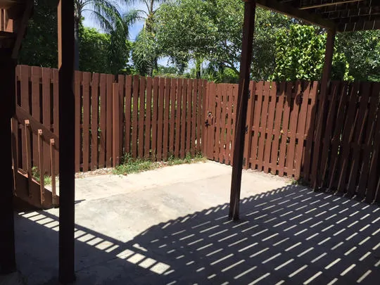 a view of a backyard of the house