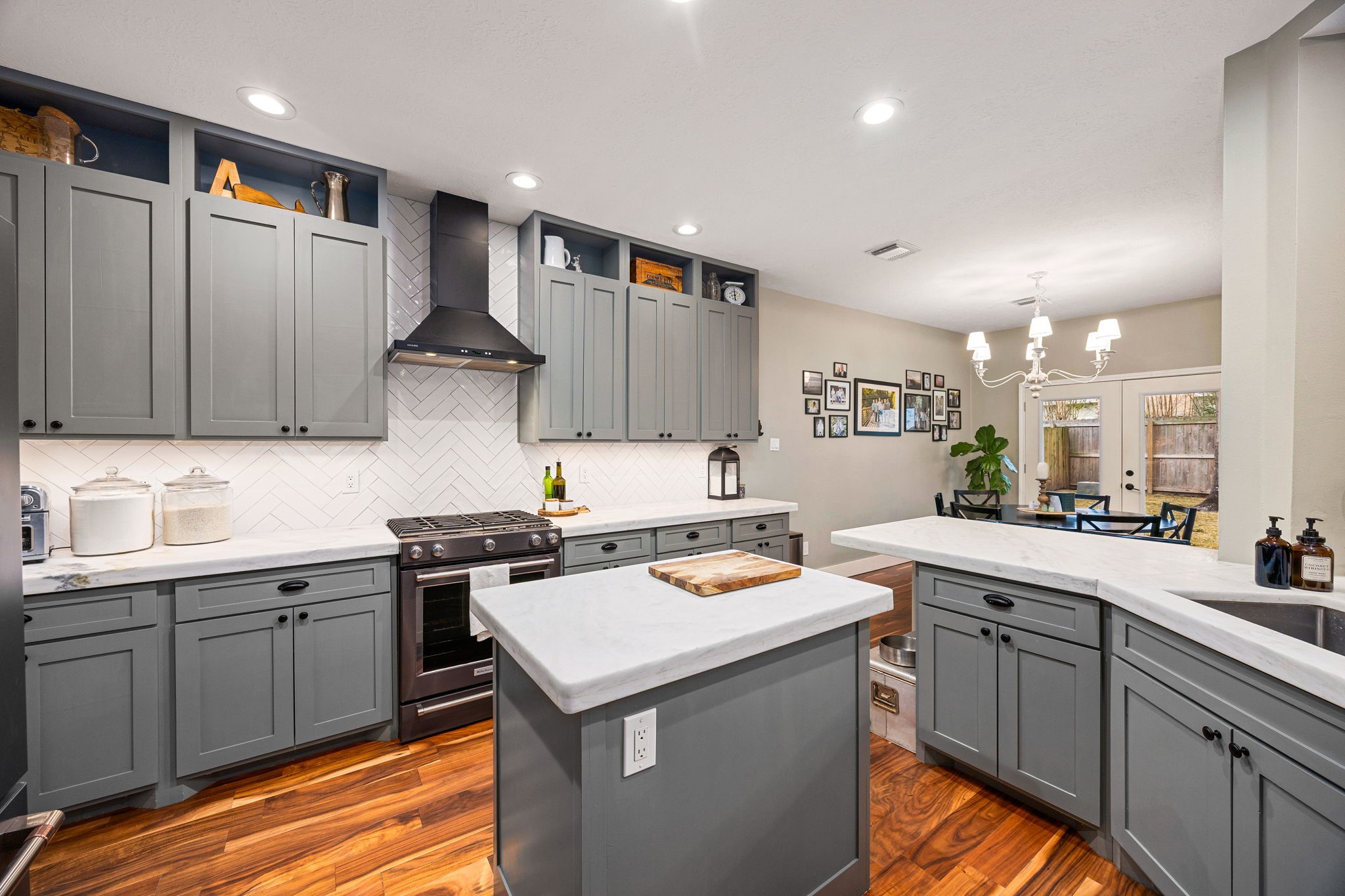 23107 Burcan Court Spring, TX 77373 - Photo 12 of 42 a kitchen with a sink and cabinets