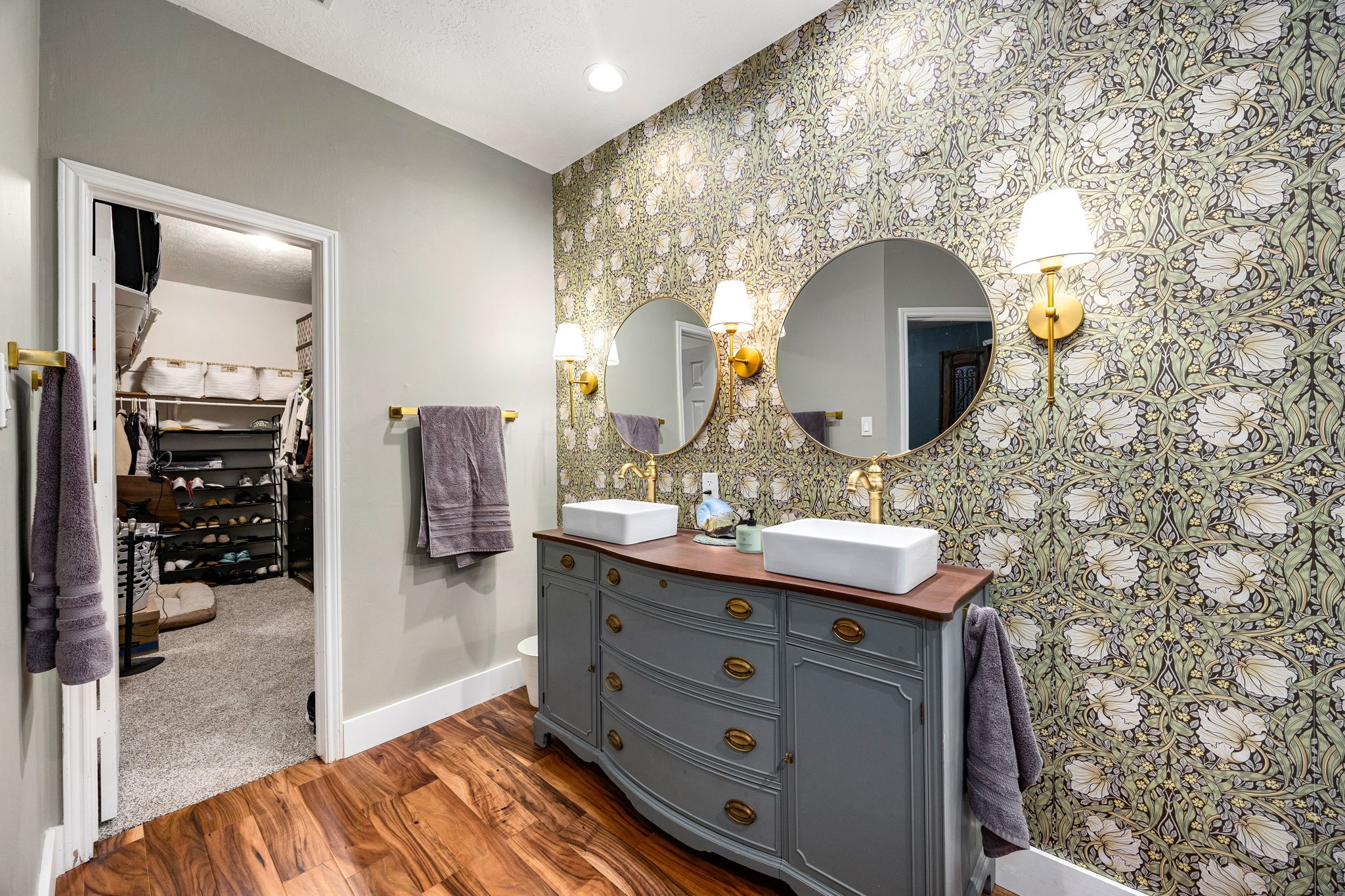 23107 Burcan Court Spring, TX 77373 - Photo 22 of 42 a bathroom with a double vanity sink and a mirror
