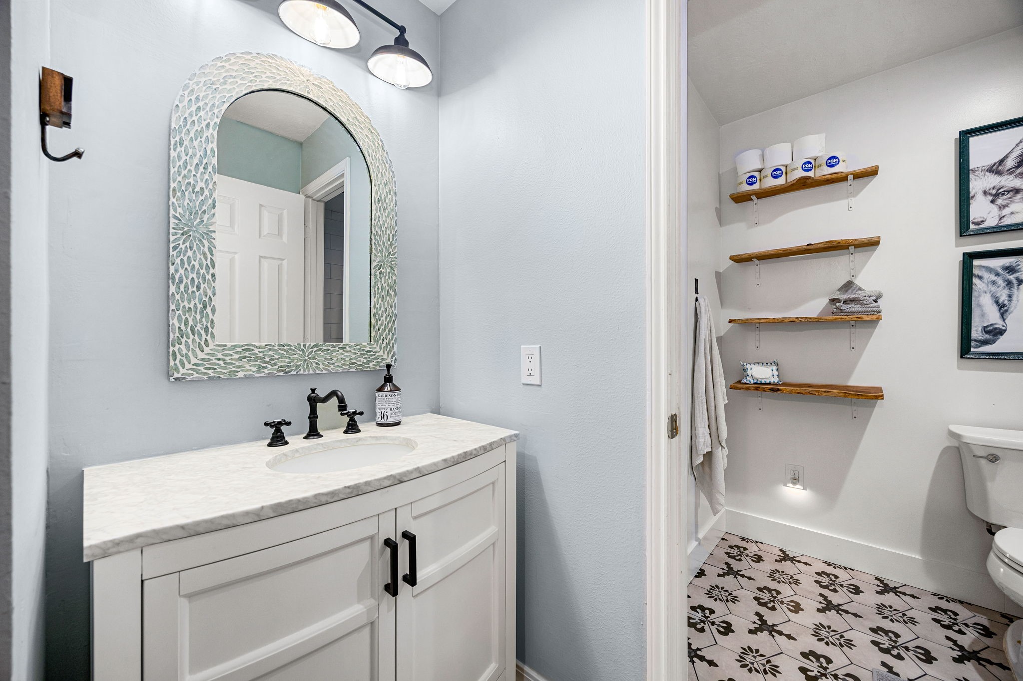 23107 Burcan Court Spring, TX 77373 - Photo 33 of 42 a bathroom with a sink a toilet and a mirror