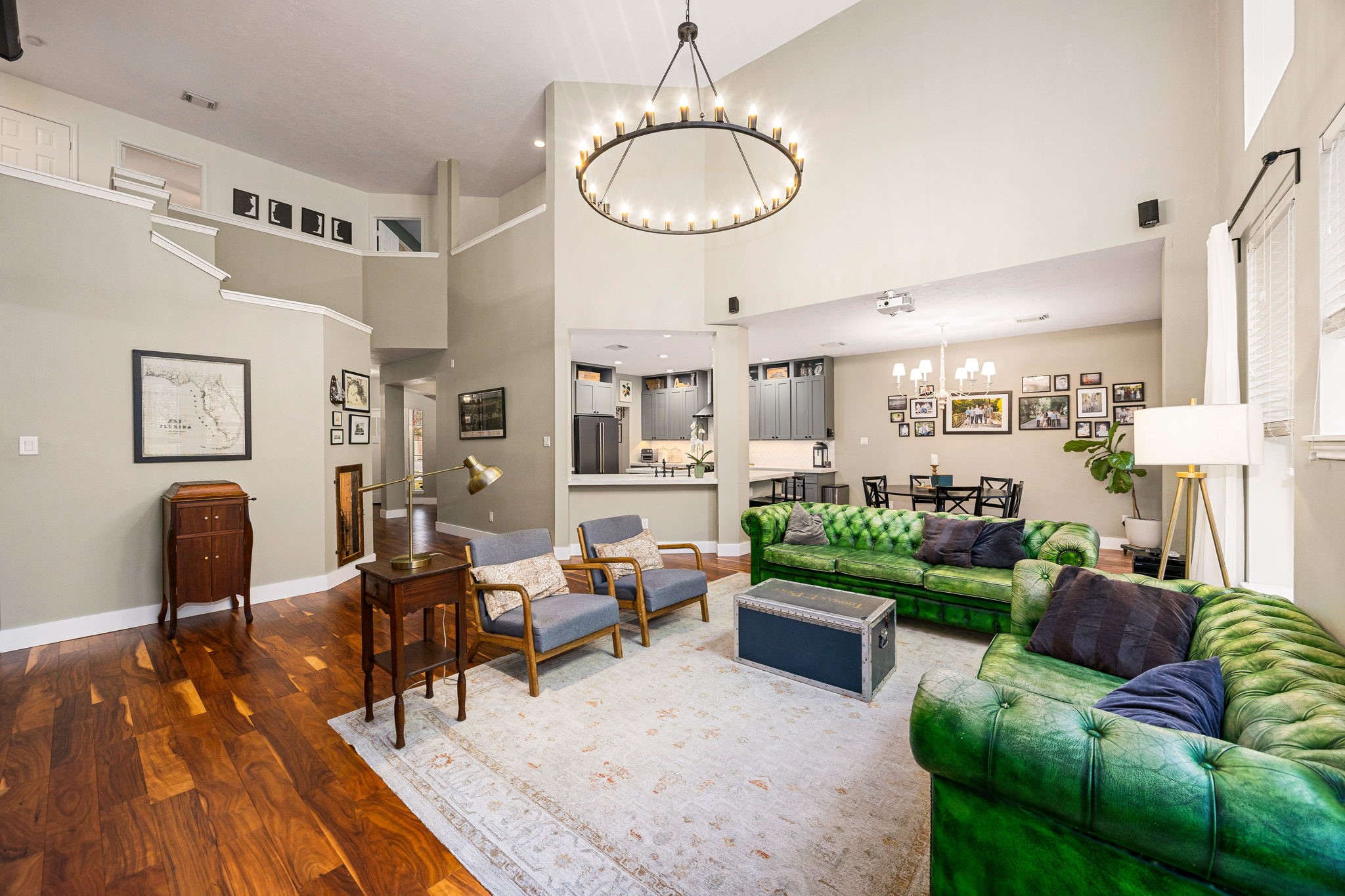 23107 Burcan Court Spring, TX 77373 - Photo 8 of 42 a living room with furniture and a chandelier