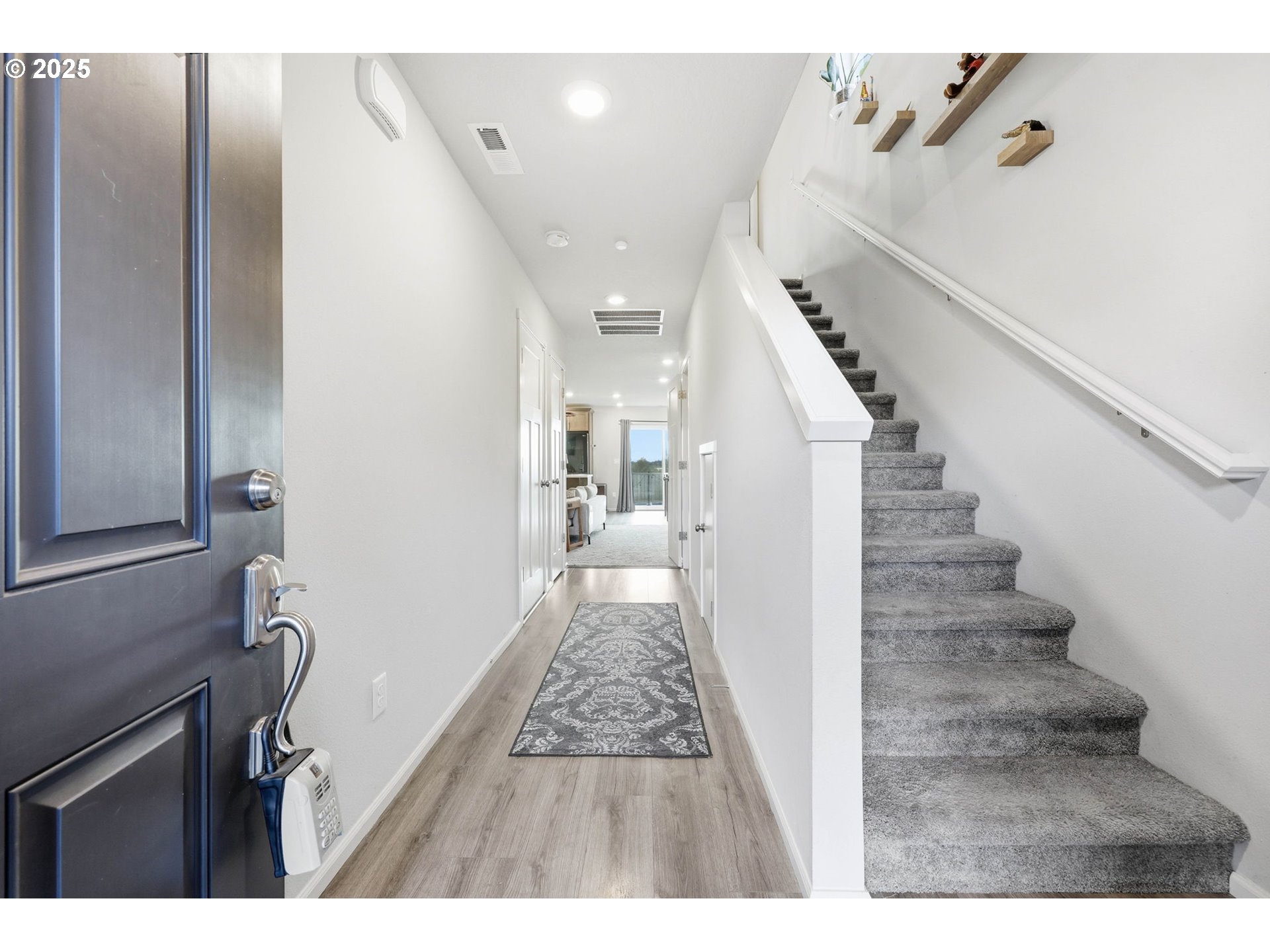 1316 19th Place Forest Grove, OR 97116 - Photo 4 of 36 a view of entryway with wooden floor