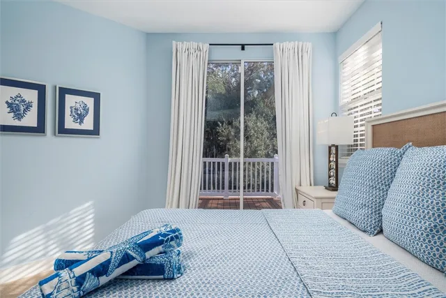 a bathroom with a shower and vanity