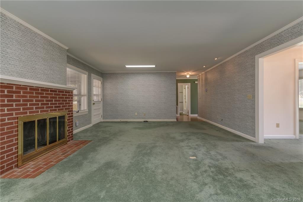 541 North Main Street Rutherfordton, NC 28139 - Photo 4 of 35 a view of empty room with a fireplace
